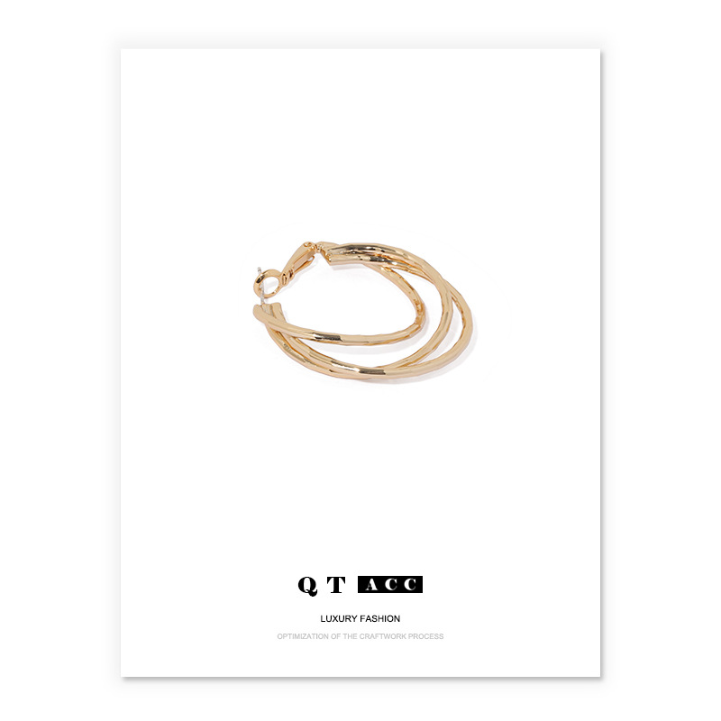 Latón chapado 18K oro real moda ins elegante europeo y americano versátil círculo laminado línea pendientes moda femenina