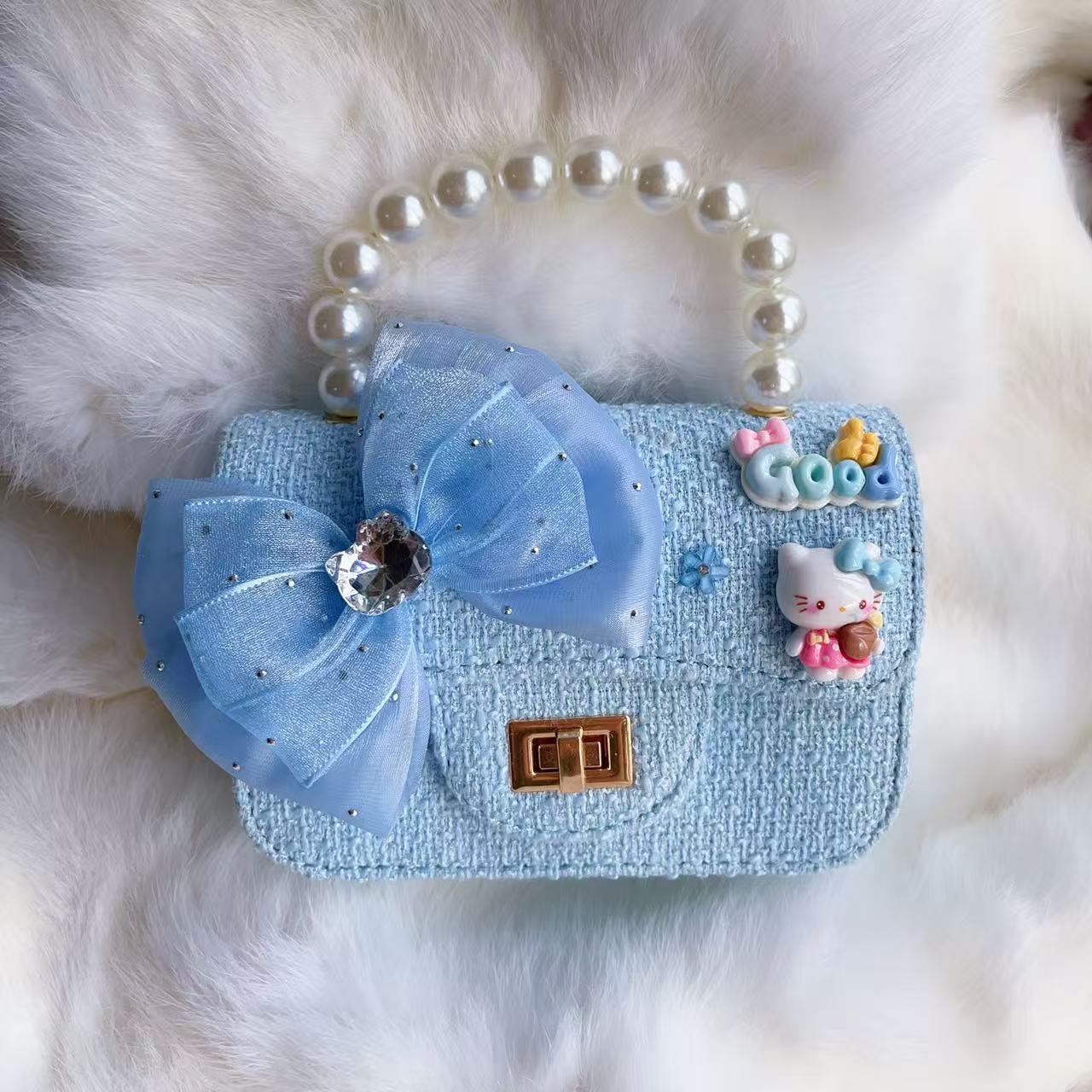 Bagos de perlas para niños 2025 nuevos bolsos de niños bolsos de mochila de niñas bolsos accesorios de princesa bolsos de viento de fragancia