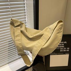 大容量包包女時尚餃子包包通勤小眾設計感帆布褶皺單肩斜挎包