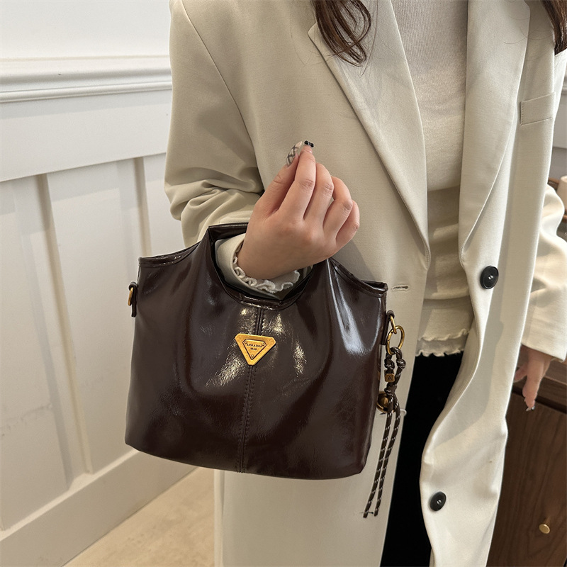 2024 alto valor retrógrado estilo de negocios Meillard bolso de cubo de mano de viaje versátil de invierno nuevo bolso de hombro