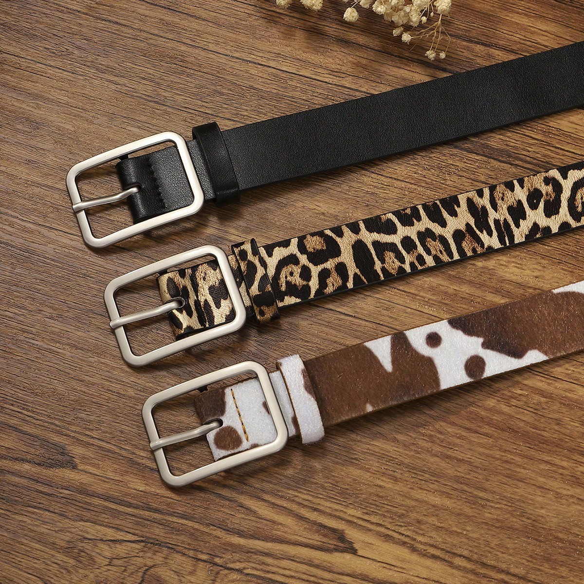 Ventas directas de fábrica en stock nueva hebilla japonesa patrón de leche en blanco y negro pelo de caballo de las mujeres moda de pelo falso correa de PU transfronteriza