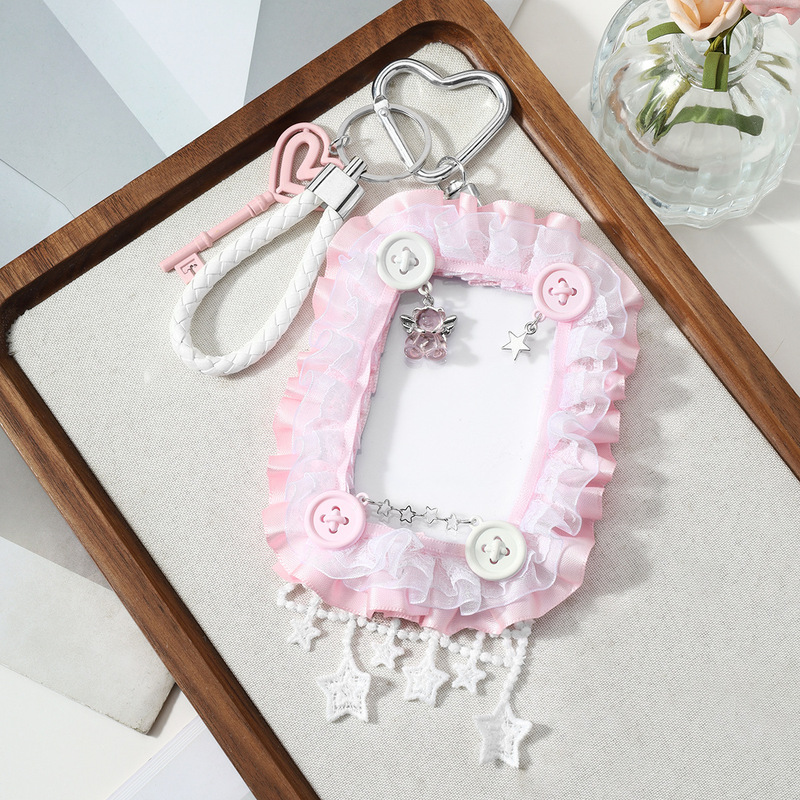 Fresh and cute multi-color faux pearl wrist strap with bow, bear wings, ruffled lace, card holder, keychain, and bag pendant Fresh and cute multi-color faux pearl wrist strap with bow, bear wings, ruffled lace, card holder, keychain, and bag pendant