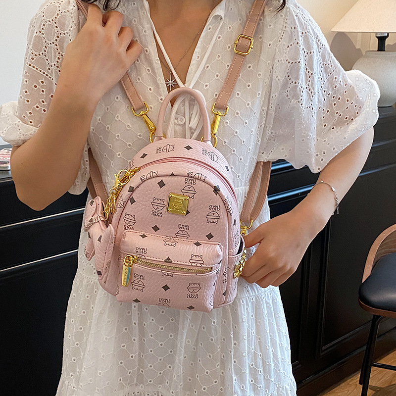 2025 nueva mochila de mujer lindo oso impresión de aire extranjero mochila de estudiantes universitarios para trabajar bolsas de mujer