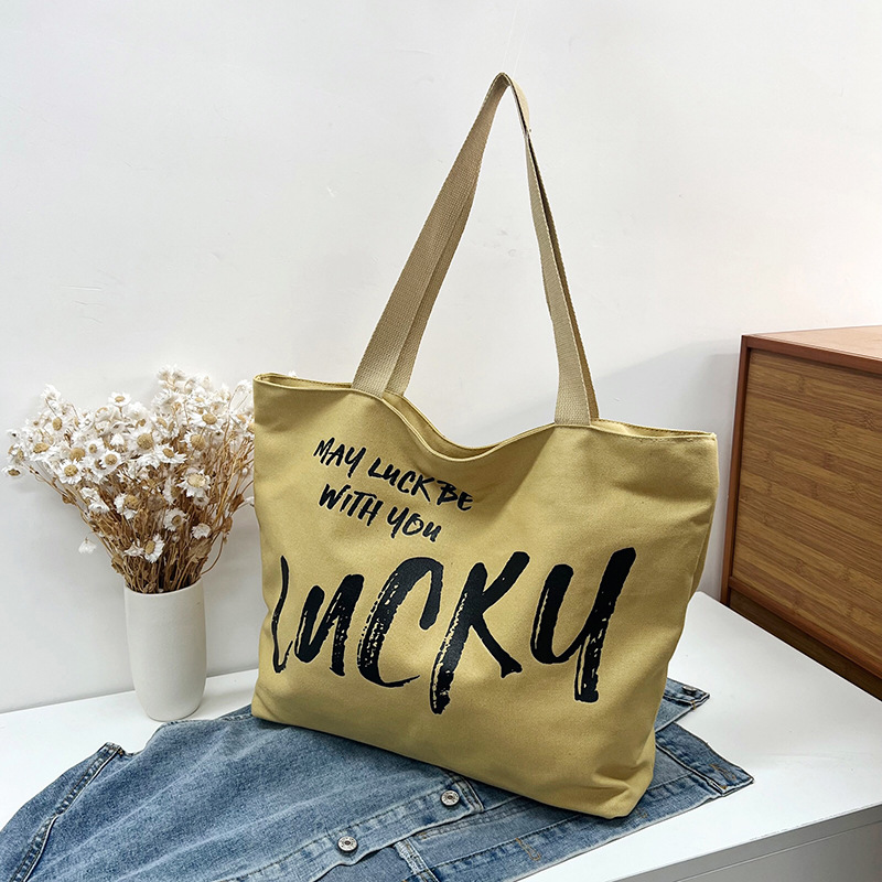 Capacious shoulder bag