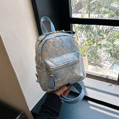 刺繡提花布雙肩包女2023新款網紅時尚休閒背包洋氣簡約百搭旅行包