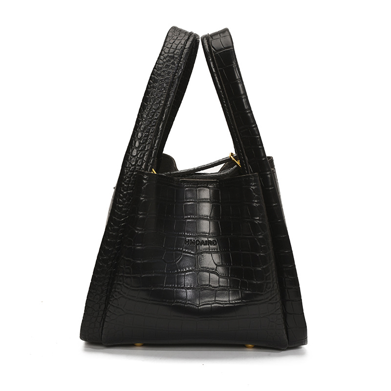 Bolso de cubo de mano de estilo explosivo con patrón de cocodrilo transfronterizo para mujer 2025 nuevo bolso de hombro con textura versátil bolso de mensajero súper caliente