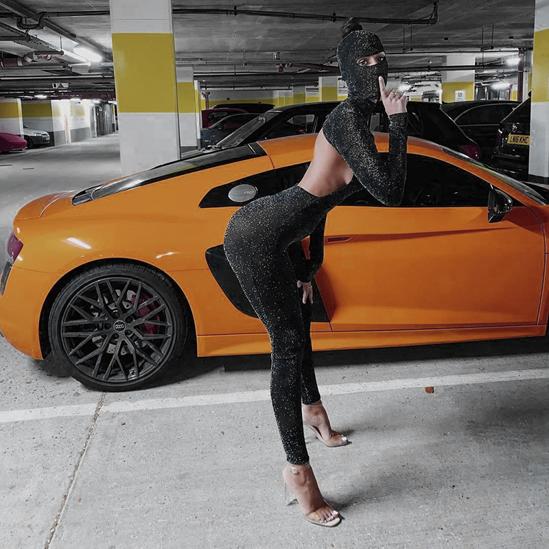 Ropa de mujer europea y americana para comercio exterior, mono de manga larga estilo nuevo 2026, mono negro ajustado sin espalda sexy con capucha, venta al por mayor