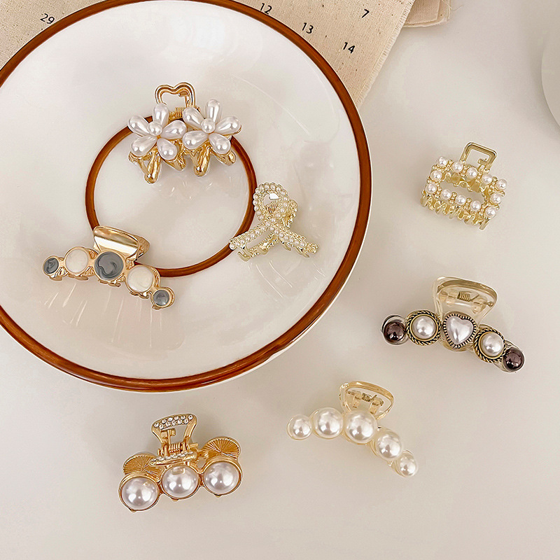 Pequeñas pinzas de cabello de perla temperamento feminino medio agarrado pinzas de cabello de borde pequeño adornamiento de cabeza de alto nivel no lastimar pinzas de cabello