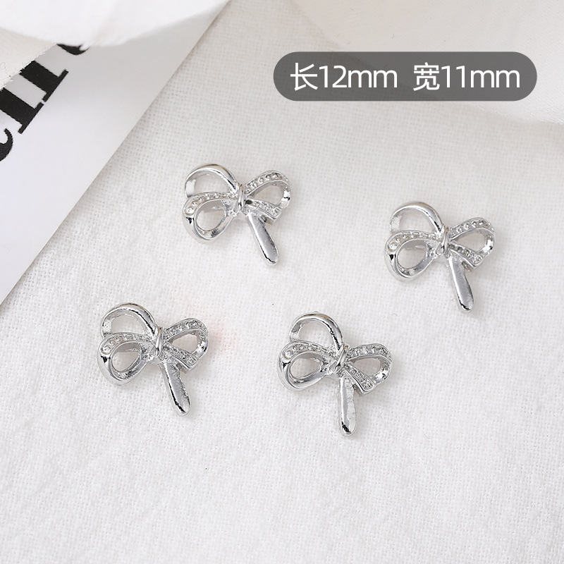 Nueva joyería de uñas, lazo, pajarita de lujo ligero, accesorios de uñas de aleación, accesorios de diamantes de uñas de celebridades de Internet tridimensionales, estilo caliente