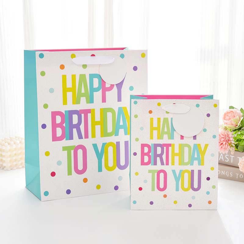 Nueva bolsa de regalo de cumpleaños transfronteriza, bolsa de mano de bronceado de alta gama, bolsa de embalaje de regalo, bolsa de papel portátil al por mayor