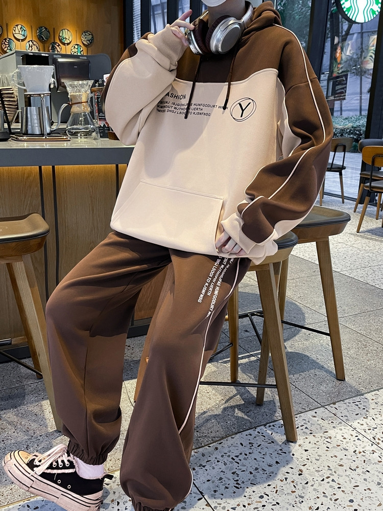 Otoño y invierno de hombre suelto encapuchado juego deportivo casual juvenil hombre con camiseta gruesa de dos piezas