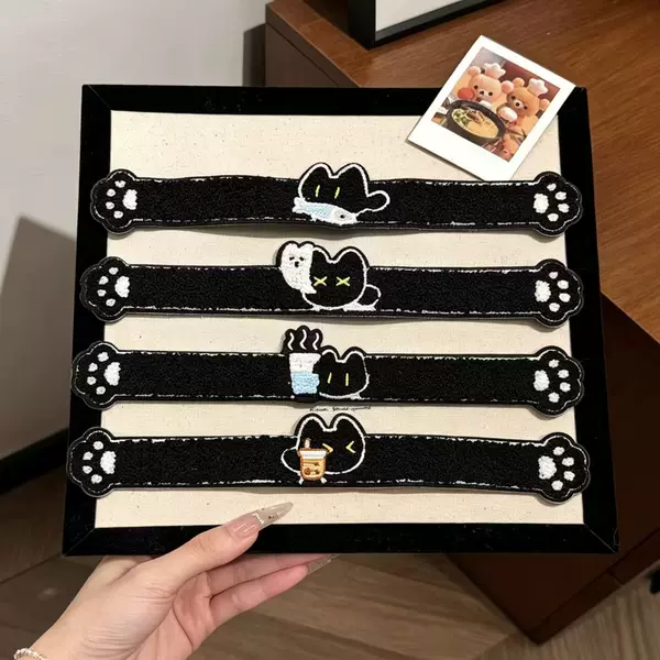 Cute black cat magic bangs stickers, plush embroidered long strip hair accessories, wholesale from the hair accessory factory for girls