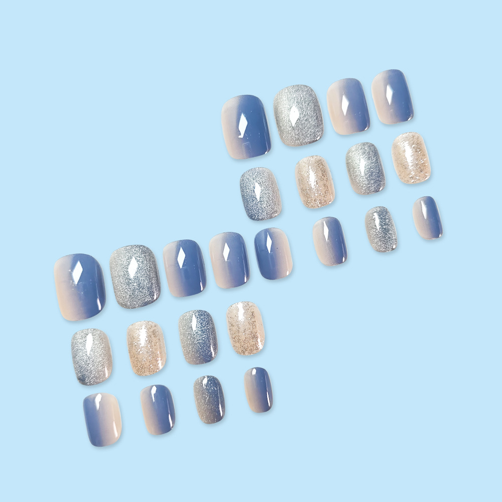 Comercio exterior otoño y invierno gradiente ojo de gato usar uñas azul y blanco brillante sensación de atmósfera de uñas 24 piezas de uñas falsas más vendidas