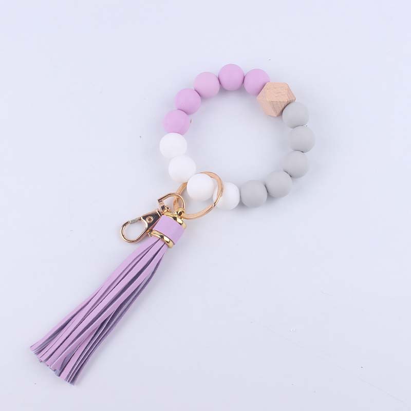 Pulsera de silicona pulsera llavero nuevo creativo DIY borla colgante contraste color