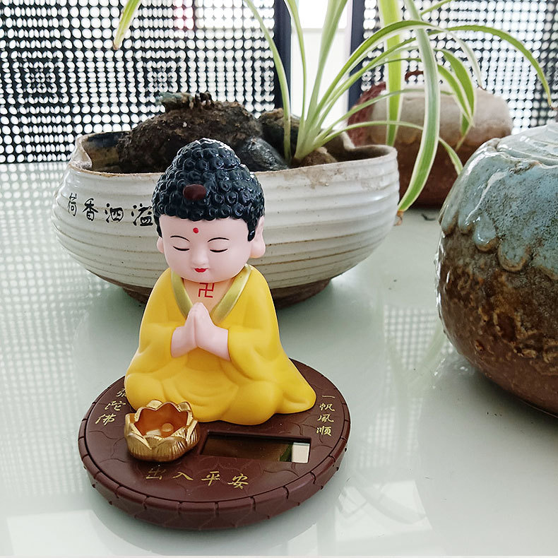 Solar car ornaments Buddha shook his head center console jewelry Net red doll boutique accessories factory direct sales