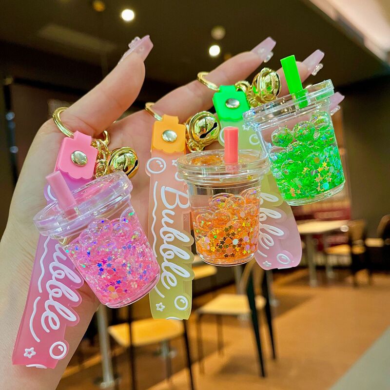 Oil-filled luminous bubble pearl milk tea cup keychain cute liquid quicksand pendant schoolbag accessories small gift wholesale