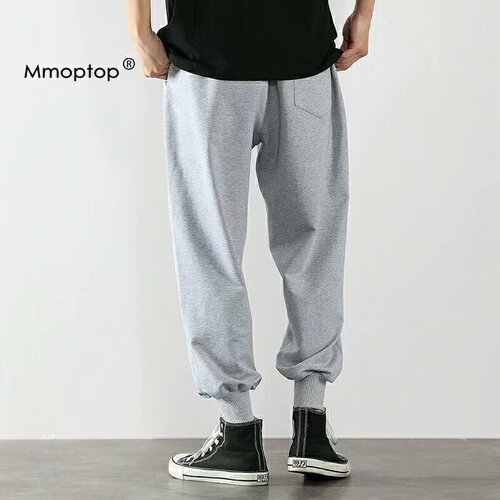 Summer lightweight pants for men: trendy gray ankle-banded, loose-fit sports basketball sweatpants—versatile, knitted, and cropped.