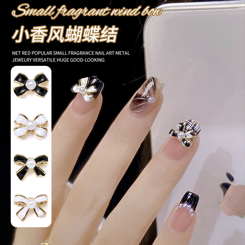 Net red explosions small fragrance nail art alloy jewelry oil Pearl bow black and white simple French jewelry wholesale