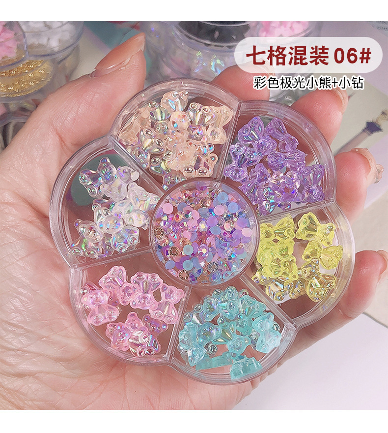 Venta caliente transfronteriza cinta de arco de uñas perla diamante Aurora oso 7 rejilla tocadiscos joyería de uñas al por mayor