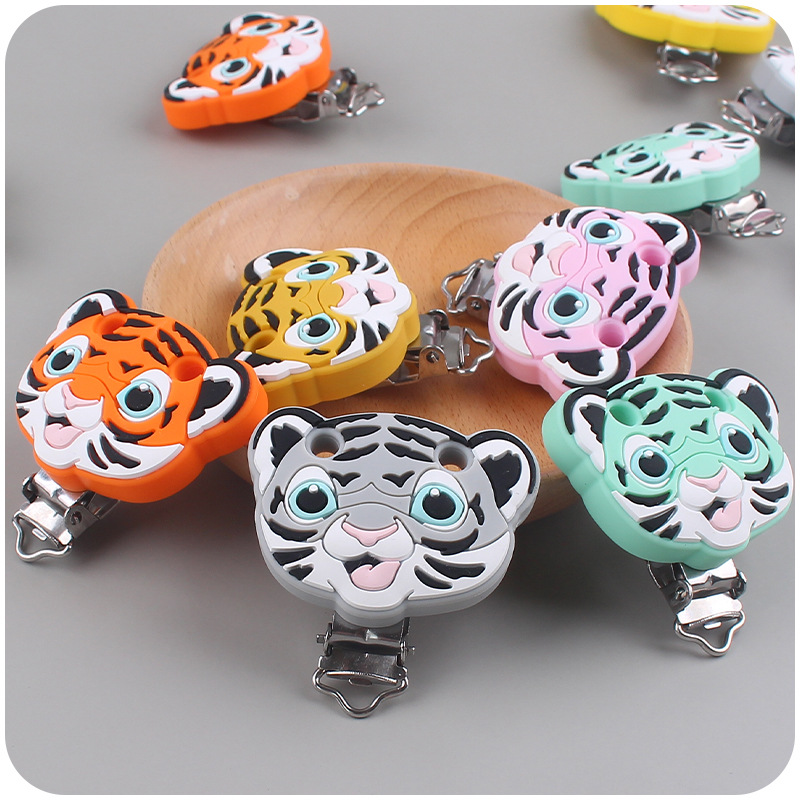 Nuevo bebé suministros de dibujos animados de silicona animal Tigre forma calmante bebé chupete de silicona anti-gota clip de cadena