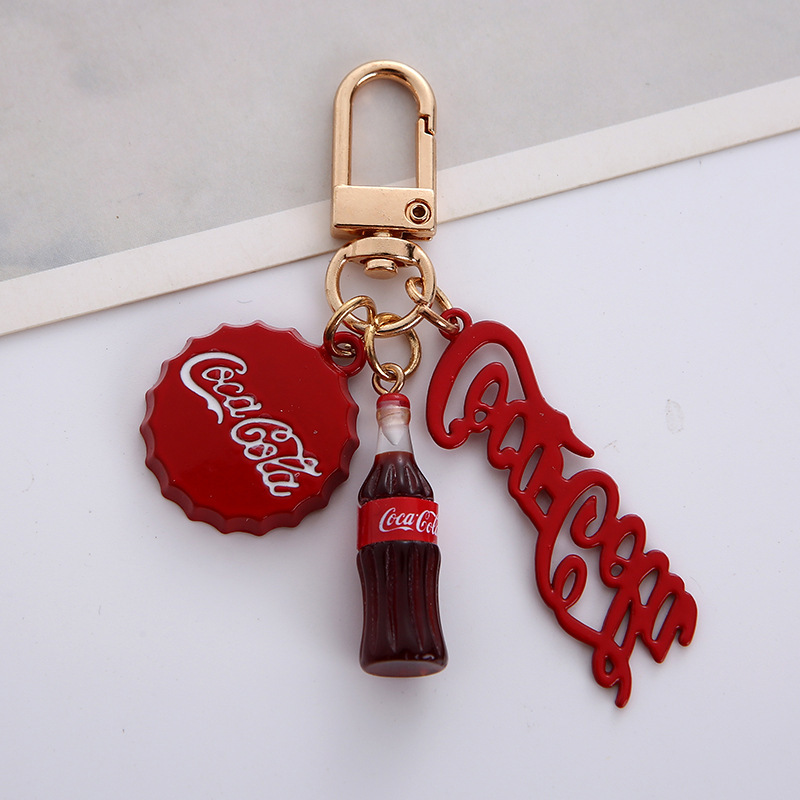 Cute cartoon Coke bottle key ring creative airpods2 earphone cover small fresh bag pendant small gift Cute cartoon Coke bottle key ring creative airpods2 earphone cover small fresh bag pendant small gift
