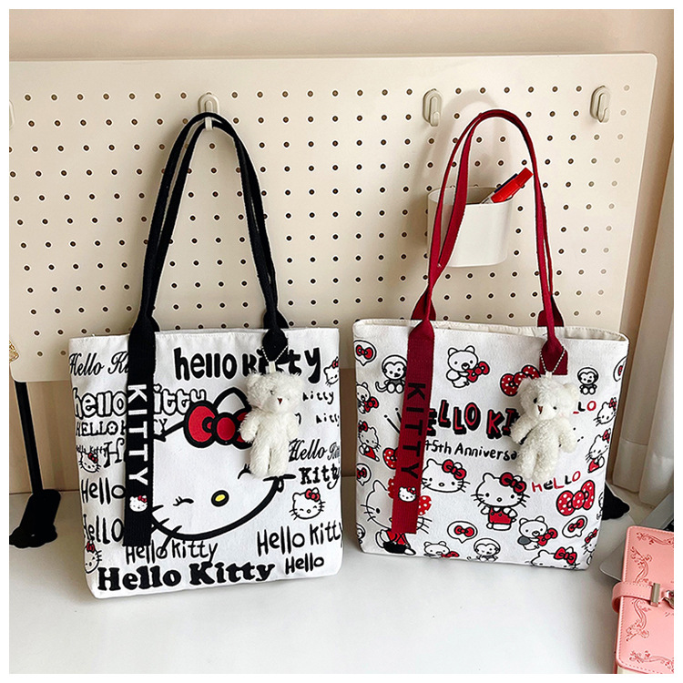 The new fashionable cartoon canvas bag, simple and versatile tote bag, cute commuting single-shoulder tote large bag, is selling well across borders undefined