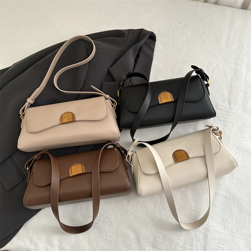 Bolsa de moda de tendencia 2025 primavera nuevo simple ocio de hombro bolso cuadrado sensación extranjera nicho mochila