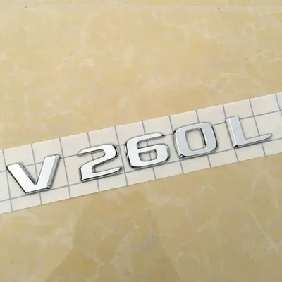 Mercedes-Benz V260L modified with Maybach VS680L tail emblem, VS980L lettering, and 560 car emblem, featuring English lettering (Car logo) - standard-v260l