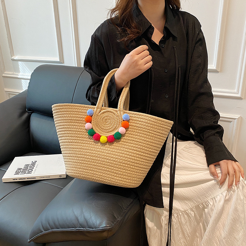 Una pieza de envío, versión coreana del bolso tejido de paja con cuerda de algodón, bolsa tejida con canasta de bolas de lana, bolsa de textura de alta calidad