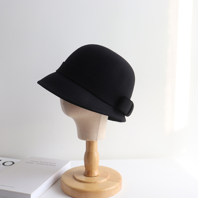 Estilo francés poco Hepburn frente Largo trasero corto arco sombrero de lana pescador cuenca sombrero blanco crema pequeño ala sombrero femenino