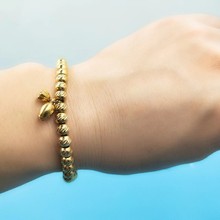 2022年新款两世欢鱼尾纹钛钢镀18k金女手镯旅游纪念手环