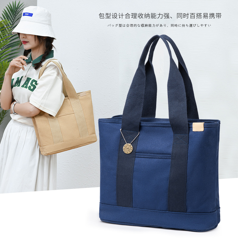 新款大容量单肩包手提帆布包通勤便当帆布袋女纯色休闲女士托特包