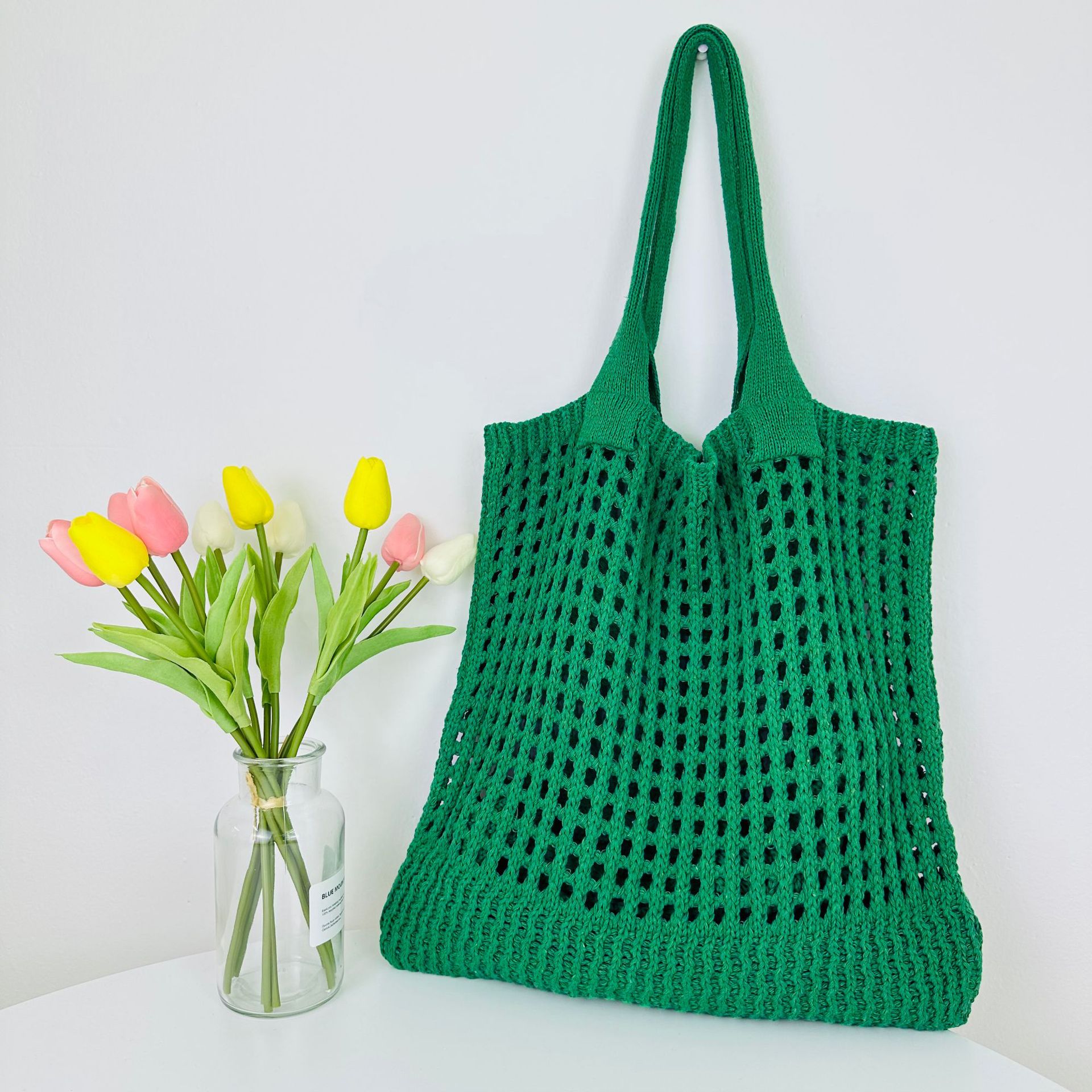 2023 nueva bolsa transfronteriza bolso de mano japonés y coreano bolsa de color sólido bolsa de punto bolsa hueca bolsa de hombro bolsa tejida