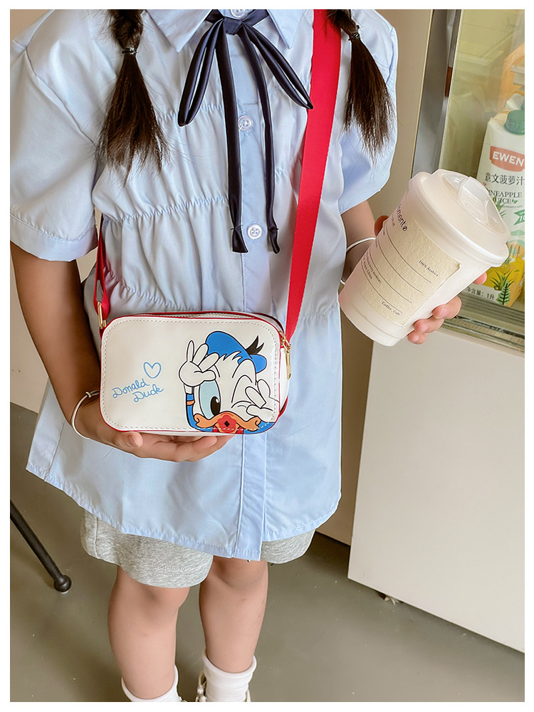 The 2025 new children's mobile phone bag is a trendy, fashionable, fresh, sweet, cartoonish, creative and simple single-shoulder crossbody bag for women undefined