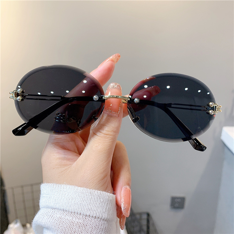 New Sunglasses Women's Oval Gradient Sunglasses Frameless Cutting Edge Trendy Glasses_voghion.com