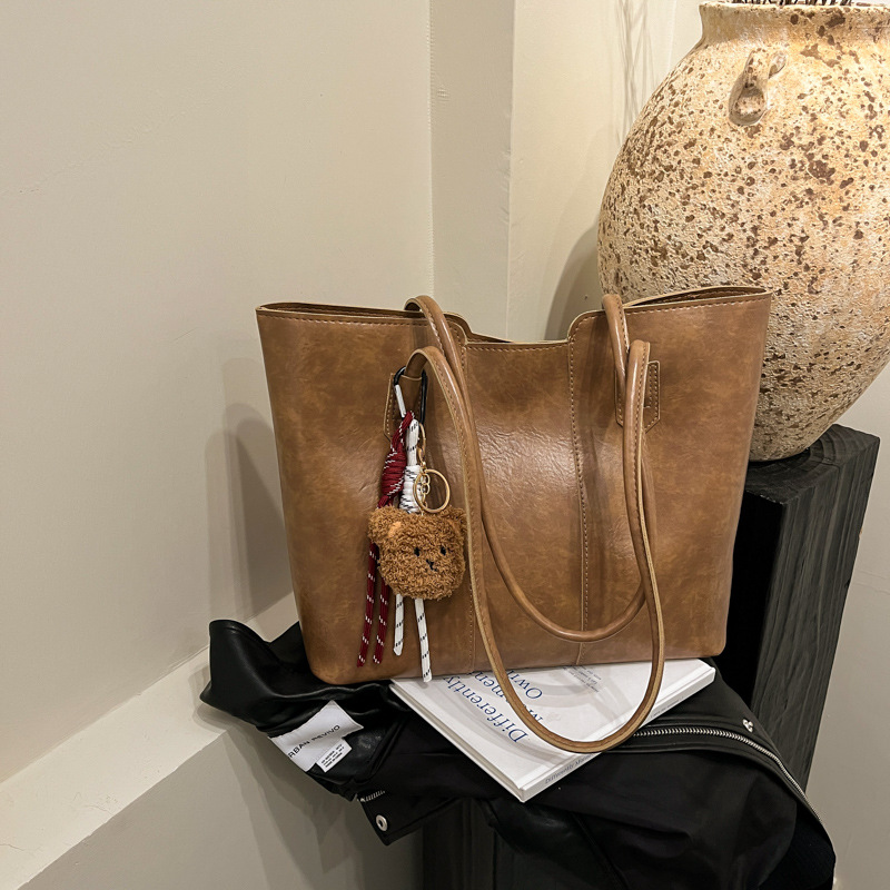 Bolso de gran capacidad de viajero de temperamento de alta gama para mujer 2024 nuevo otoño e invierno bolso de hombro de lujo ligero bolso de ocio