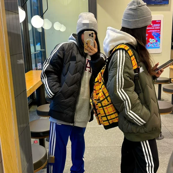 High-quality autumn and winter new cotton-padded jackets for men and women, windproof sports cotton-padded jackets with stand-up collars, cold-resistant and warm jackets with embroidered logos for men