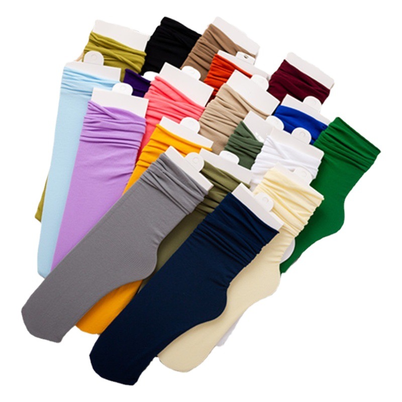 Calcetines de mujer de color sólido calcetines de hielo delgados calcetines de verano de terciopelo a media pierna calcetines de pila japoneses calcetines de caramelo transpirables al por mayor