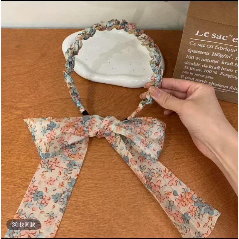 Pale pinkish gray