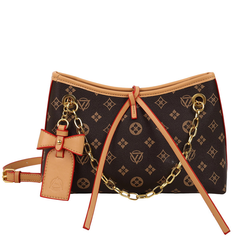 Bolso de cadena de textura transfronteriza 2025 verano nuevo bolso femenino retro bowknot bandolera moda contraste color bandolera