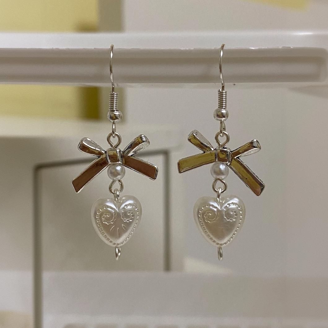 Bow Hollow Love Pearl Personality And Fashion Cold Wind Earrings For Ladies