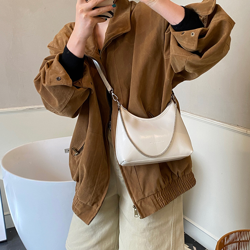 Bolso de brazo de cadena extranjera transfronteriza de invierno de mujeres 2025 nueva textura de moda bolso de hombro bolso de cara brillante