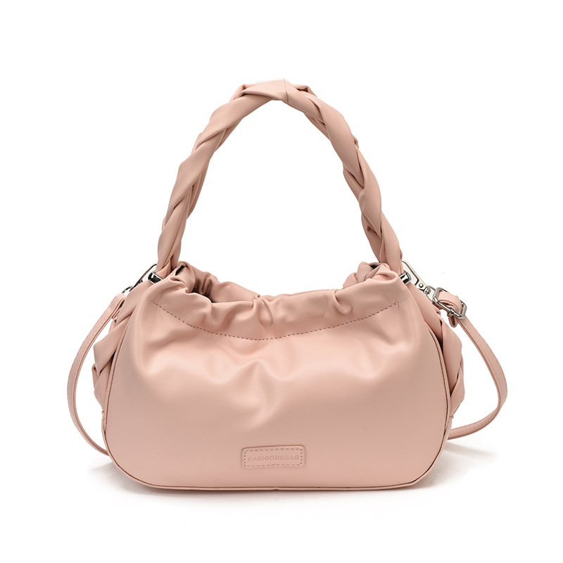 Corea del Sur nueva bolsa de mano plegada mujer 2026 primavera nicho versátil bolso de mochila simple de moda bolsa de nube de viaje