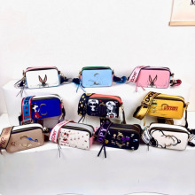 跨境PU包包女新款潮流个性简约卡通斜挎包高级感印花撞色相机包女