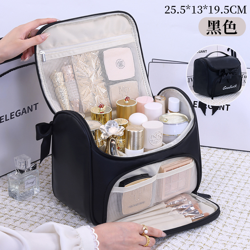 Luz lujosa pequeña fragancia arco bolsa de maquillaje mujer gran capacidad de viaje portátil división impermeable bolsa de almacenamiento de lavado de alto nivel