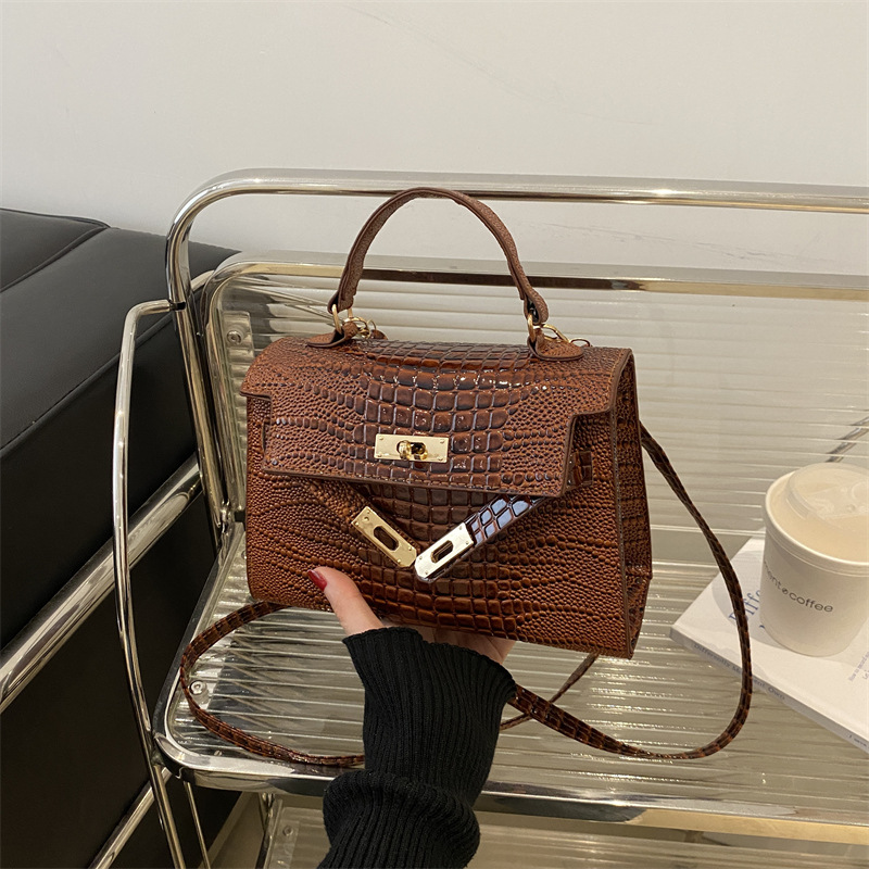 Bolso de mano con textura de nicho francés 2025 nuevo bolso femenino moda simple bolso de mensajero arte popular Kylie