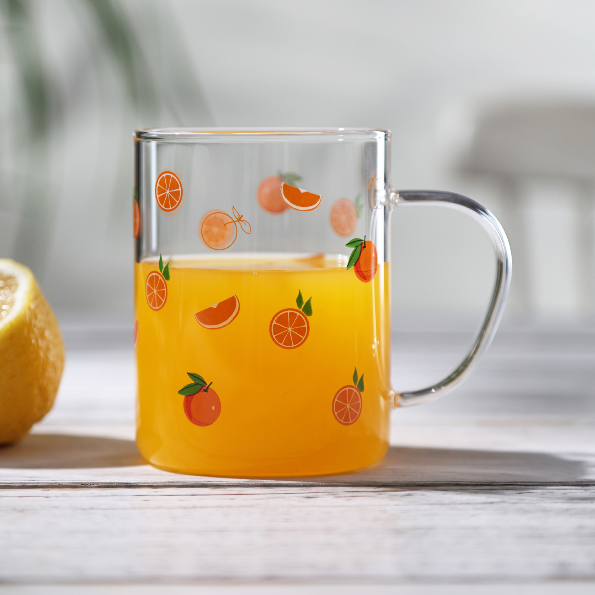 Spot al por mayor impresión de tazas de vidrio resistente al calor comedor doméstico con mango de tazas de vidrio tazas de leche tazas de desayuno impresión LOGO