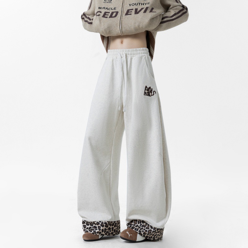 Pantalones casuales para hombres primavera y otoño de 2025 pantalones sueltos de piernas anchas de leopardo para hombres pantalones deportivos de tendencia para hombres