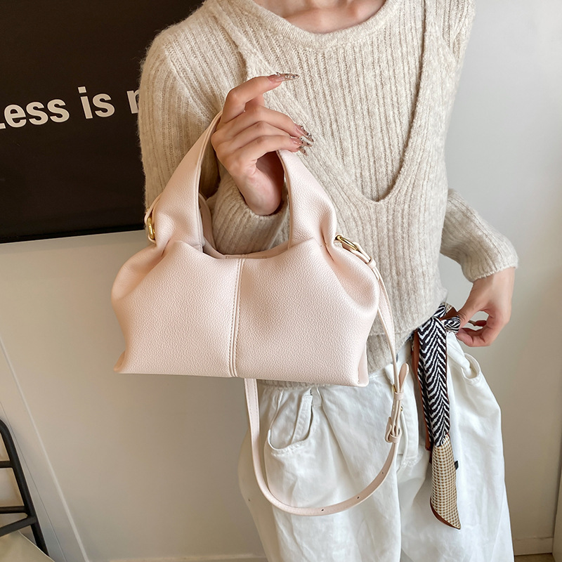 Bolso de textura transfronteriza 2025 primavera nuevo bolso femenino retro patrón de lichi bolso de hombro transmisión en vivo el mismo bolso de mensajero