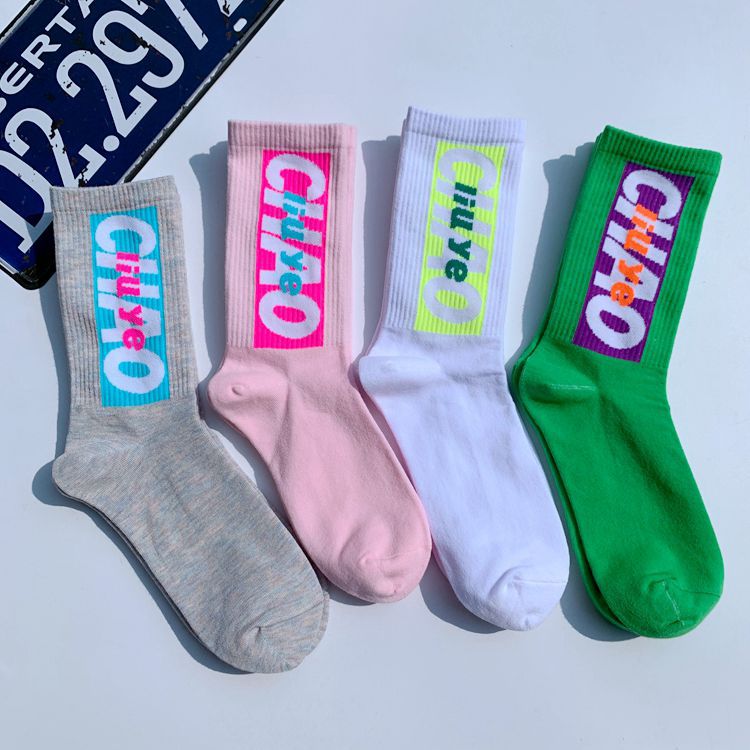 Trendy ins men's and women's mid-calf socks Japanese college style European and American Street skateboard socks couple letter sports cotton stockings